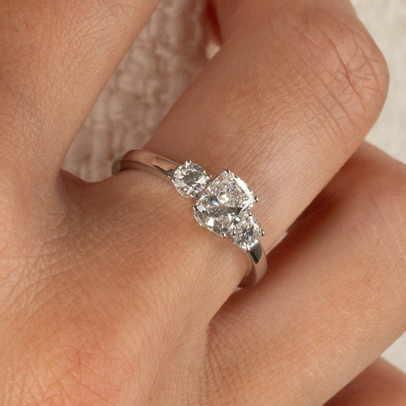 THREE-STONE RECTANGULAR CUSHION-CUT DIAMOND RING WG