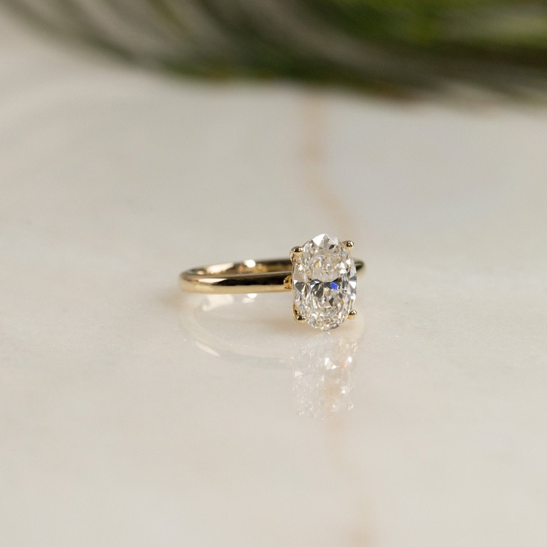 SOLITAIRE OVAL-CUT DIAMOND RING YG